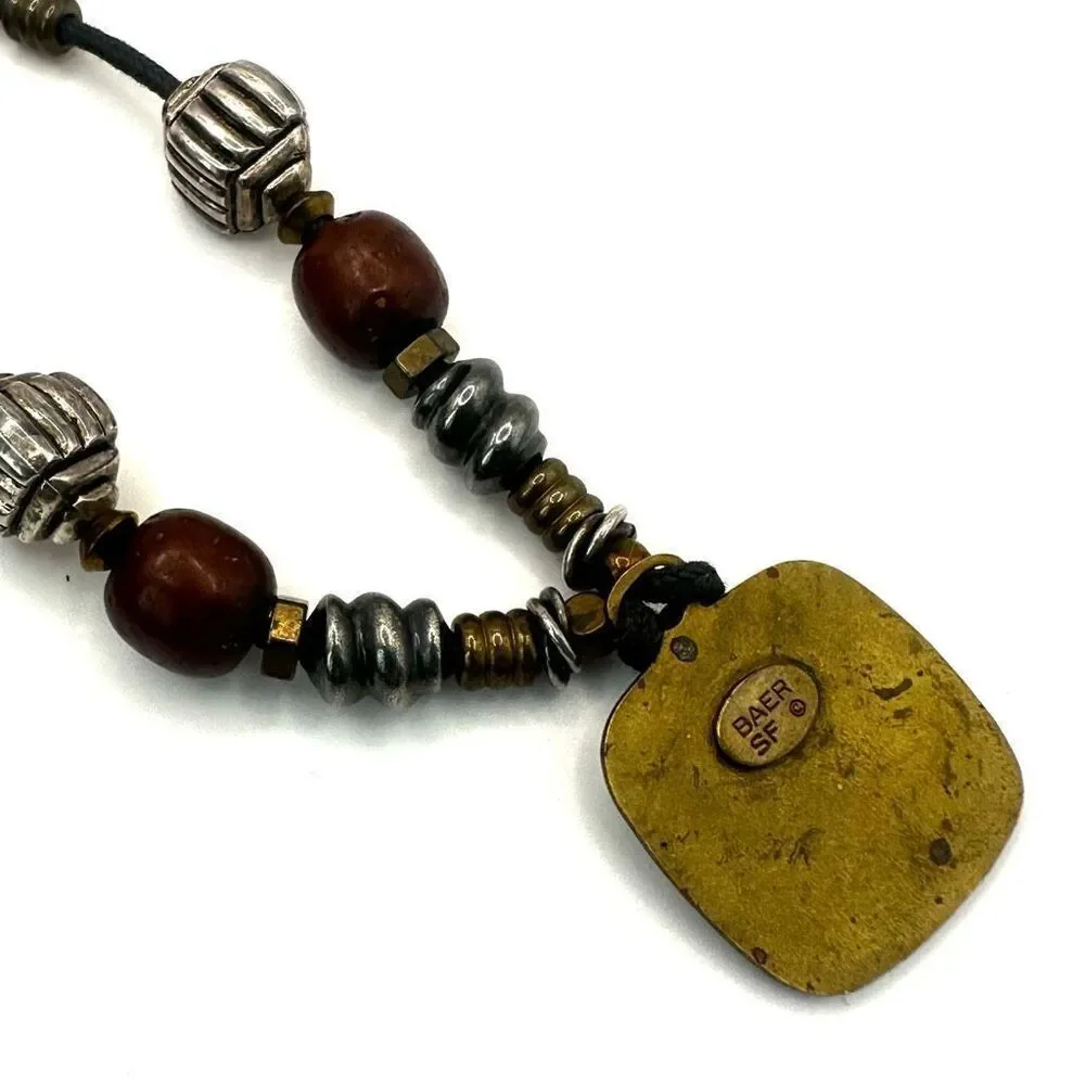 Baer SF sterling silver and brass pendant necklace on black cord